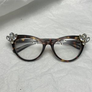 Tortoise shell and rhinestone faux glasses